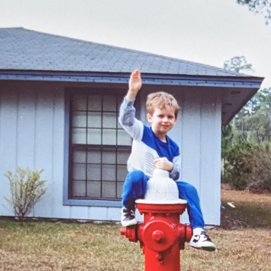 Picture of me in front of my childhood home. Ain't I cute?